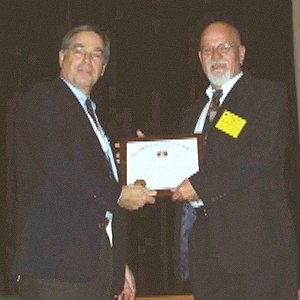 Fred Scheer receives the MBAA Sub Charter from President Larry Sidor.